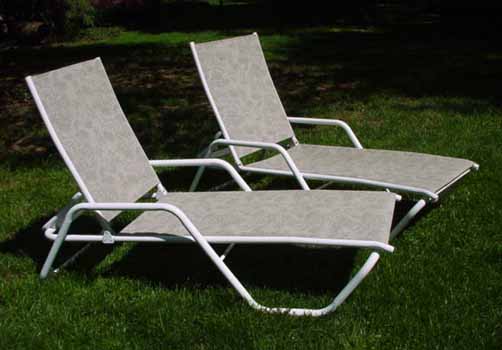 Lounge chairs done in a beautiful foliage pattern. 